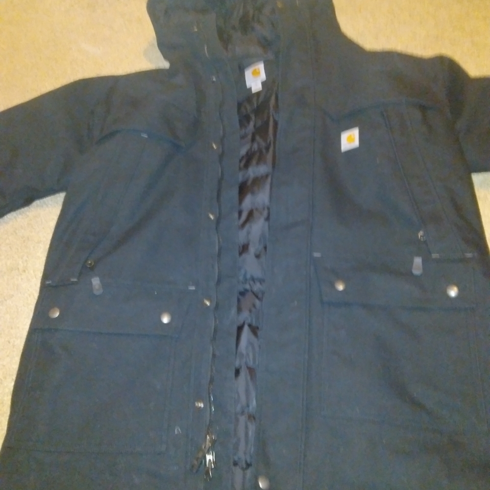 Carhartt storm defender parka with detachable fur.